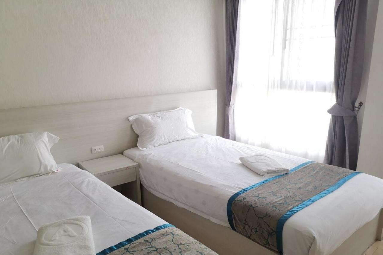 Abani Jomtien Inn Bagian luar foto