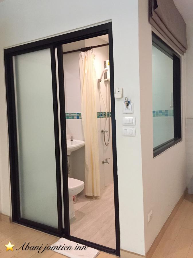 Abani Jomtien Inn Bagian luar foto